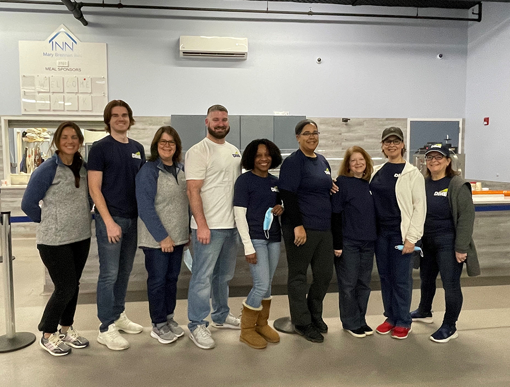 Dime employees at a local food pantry.