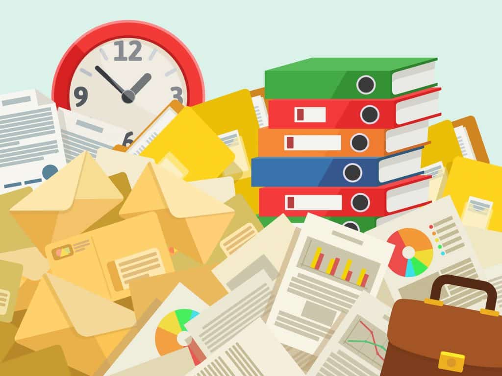 Image of cluttered paper goods. 